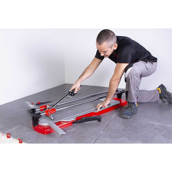 Breaking a piece of large format porcelain tile with Rubi Tools TX-MAX Tile Cutter
