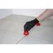  Using Rubi Tools CYCLONE Tile Leveling System at the corner of a porcelain tile