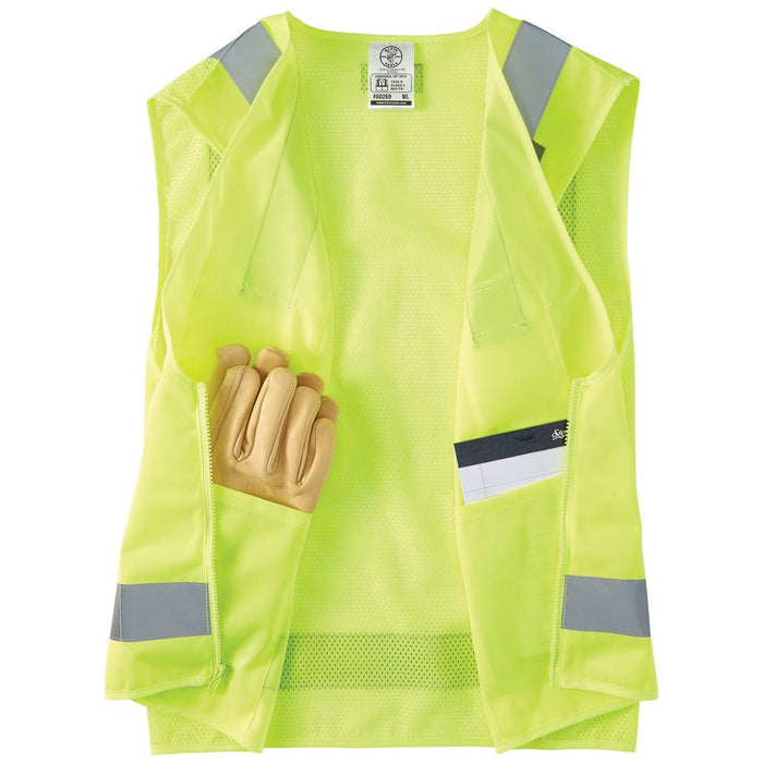 Klein Tools High-Visibility Reflective Safety Vest with accessories in interior pockets