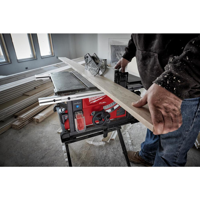 Milwaukee M18 FUEL™ 8-1/4" Table Saw cutting through long wood pieces