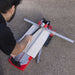 Breaking porcelain tile with professional Rubi Tools TR series tile cutter