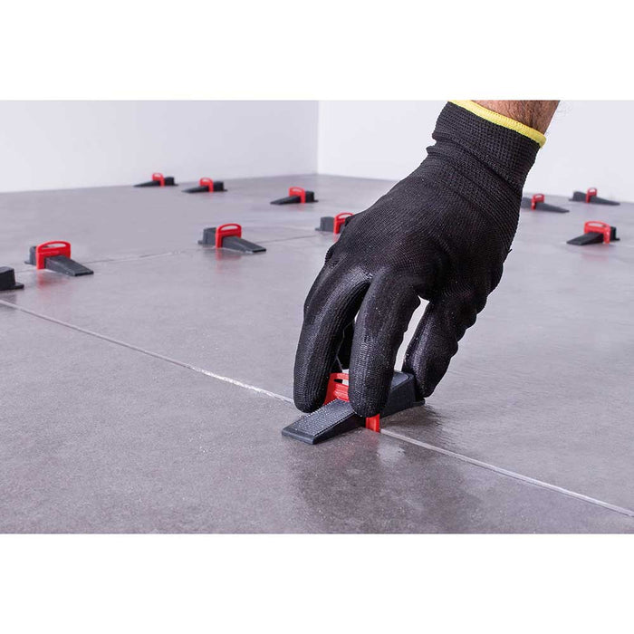 Leveling tile floors with Rubi Delta wedge and clip system