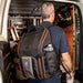 Professional contractor wearing Klein Tools Tradesman Pro™ Tool Station Backpack