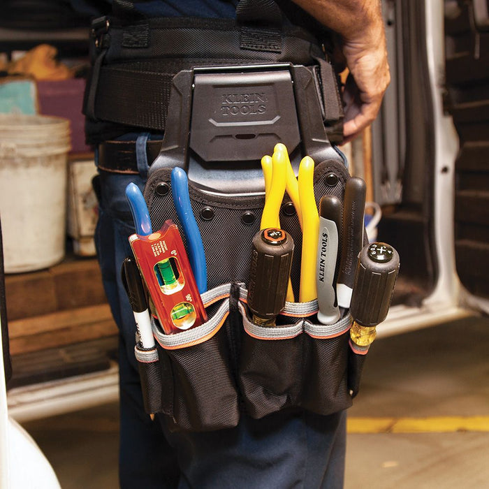 Professional electrician wearing Klein Tradesman Pro™ Modular Trimming Pouch with Belt Clip
