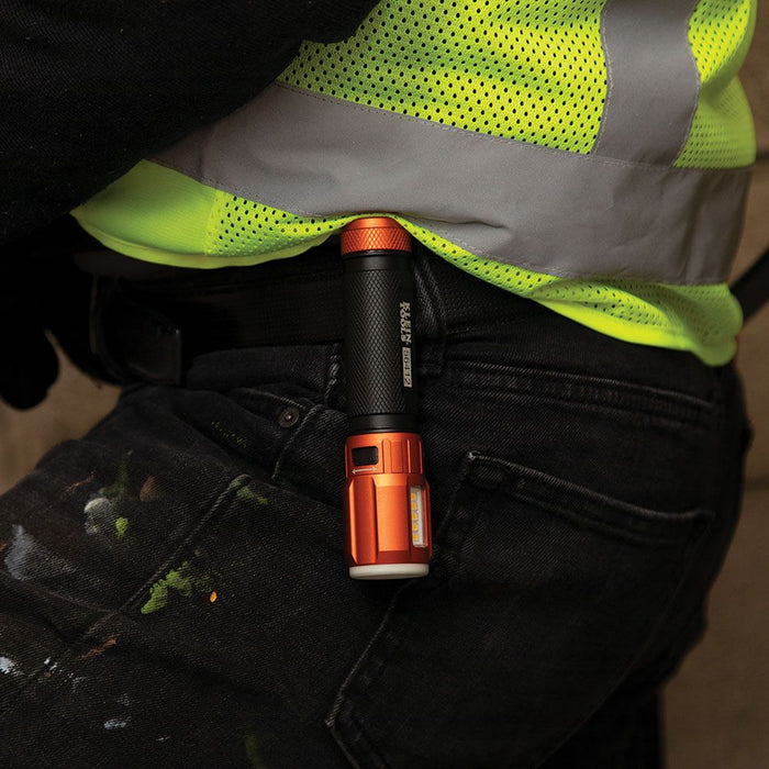 Klein Tools Rechargeable LED Flashlight on electrician's belt clip