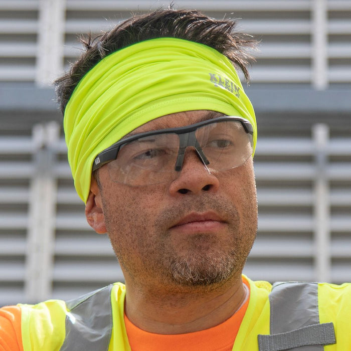 High-Visibility Yellow Cooling Band wrapped around head to cool down
