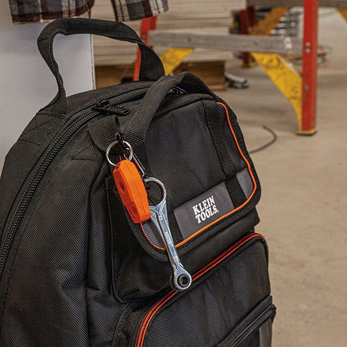 Klein Tools Slim-Profile Mini Ratchet clipped to backpack