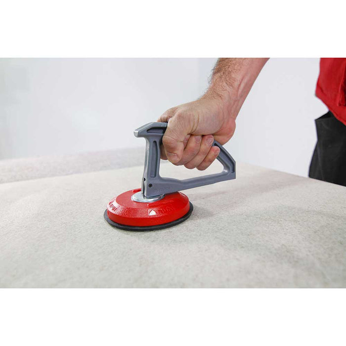 Locked Rubi Tools suction cup on textured porcelain tile