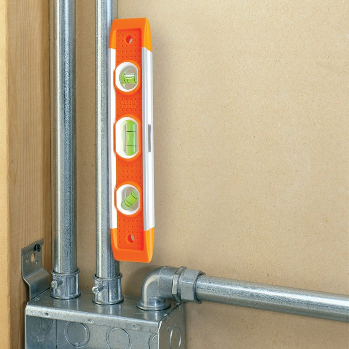 Klein Tools 9" Torpedo Level attached to metal conduit