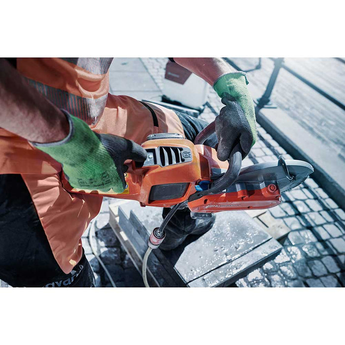 Husqvarna K 535i Battery Power Cutter with water feed attachment cutting pavers