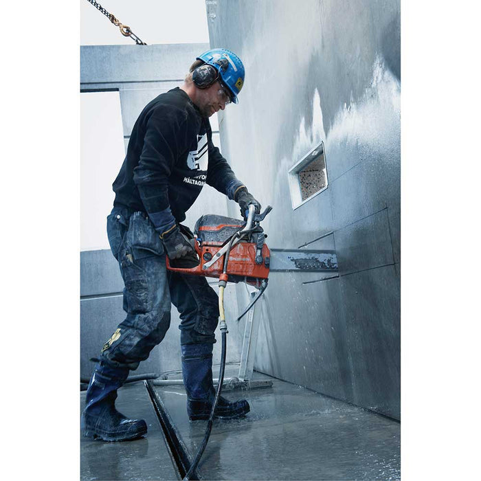 Cutting channels into concrete walls with Husqvarna K 970 II Gas Concrete Chain Saw