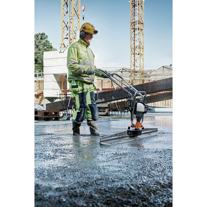 Smoothing a freshly poured concrete slab with Husqvarna BV 30 Concrete Screed