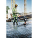 Smoothing a freshly poured concrete slab with Husqvarna BV 30 Concrete Screed