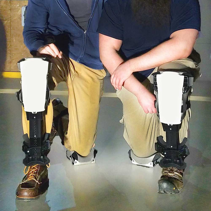 Professional ProKnee knee pads worn by two contractors kneeling