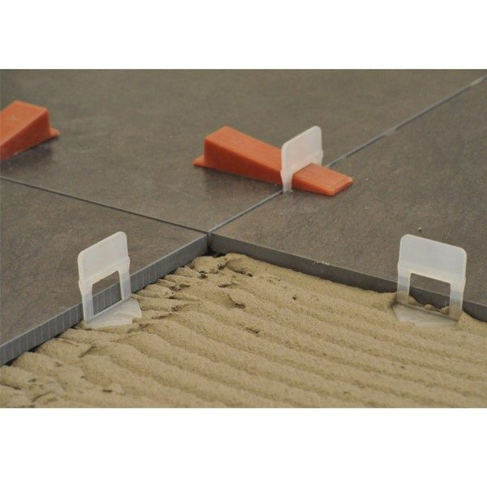 Raimondi clip and wedge tile leveling system