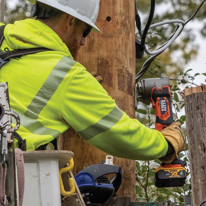Impact wrench provides versatility for better reach around a utility pole with less effort