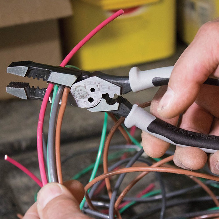 Clipping wire jackets with Klein Tools High-Leverage Hybrid Pliers