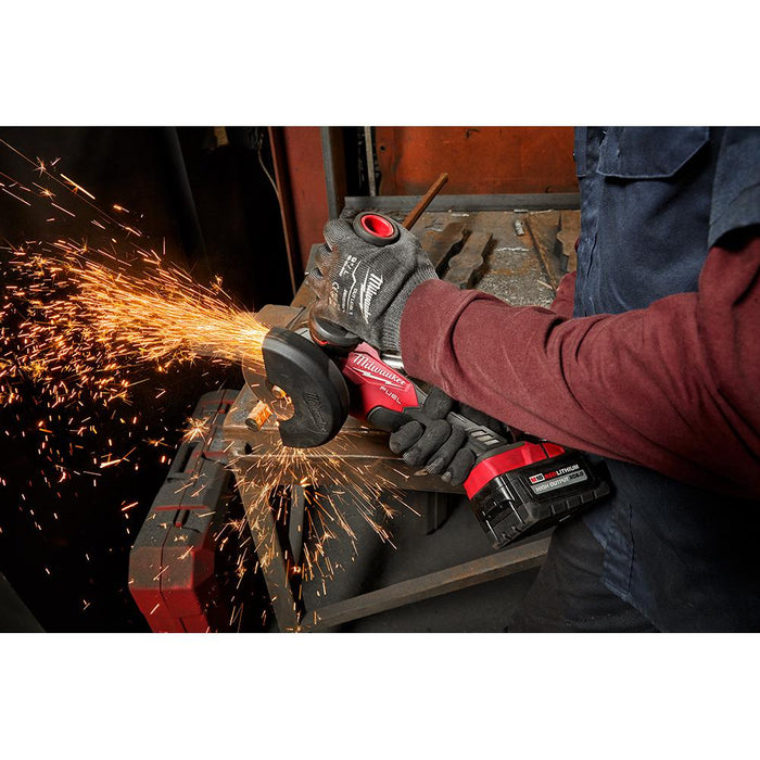 Cutting metal rods with an abrasive disc on Milwaukee Angle Grinder