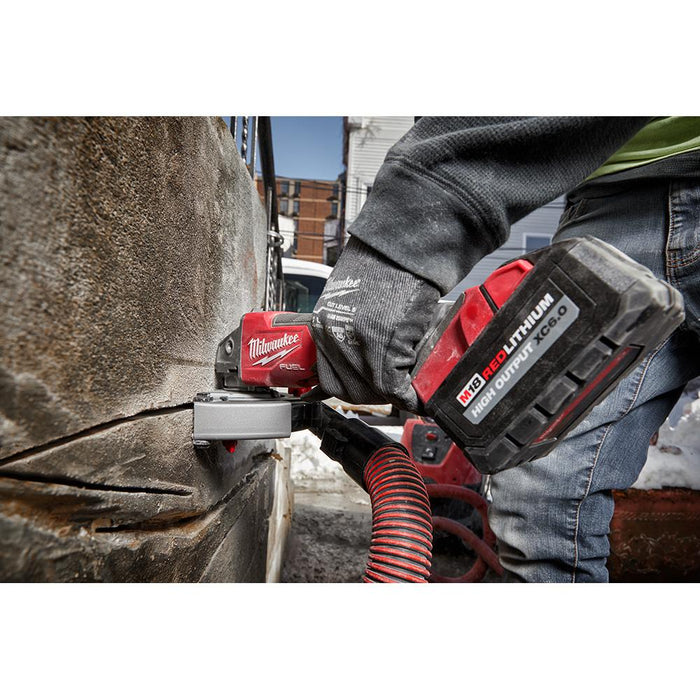 Using a crack chaser blade on concrete wall with Milwaukee angle grinder