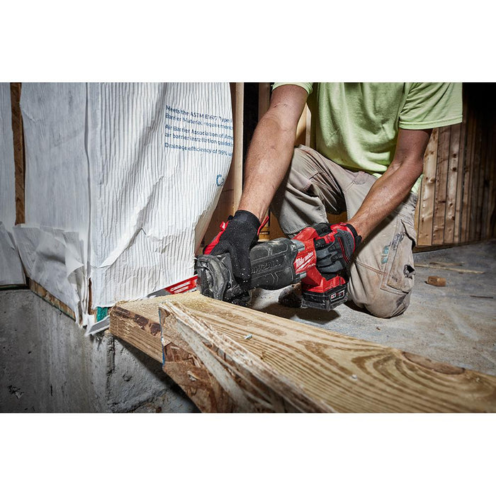 Milwaukee M18 Sawzall cutting wood frames