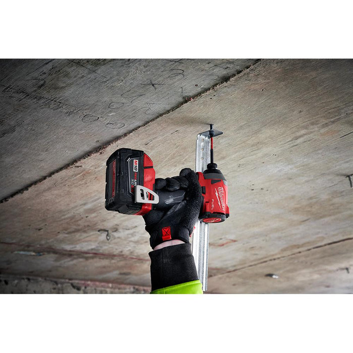 Milwaukee M18 FUEL™ Impact driver installing brackets into concrete ceilings