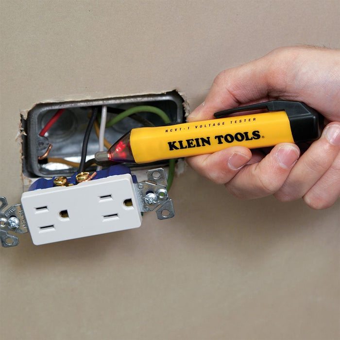 Klein Tools Non-Contact Voltage Tester Pen testing an outlet