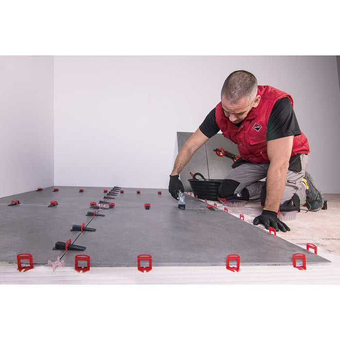 Rubi Tools DELTA Leveling System with red clips and standard pliers