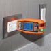 Klein Tools GFCI Receptacle Tester reading the voltage of a wall outlet